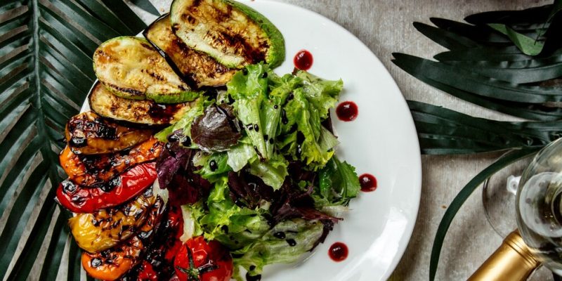 smoked-vegetables-aubergine-tomato-bell-peppers-served-with-lettuce-salad_140725-5934